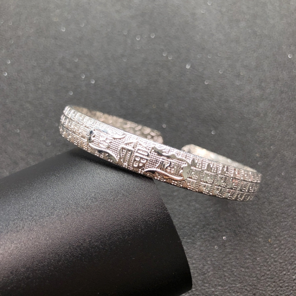 Fashion luxury love-inspired silver cuff bangle, styled on a sleek surface, ideal for elegant and trendy fashion enthusiasts in the US 03