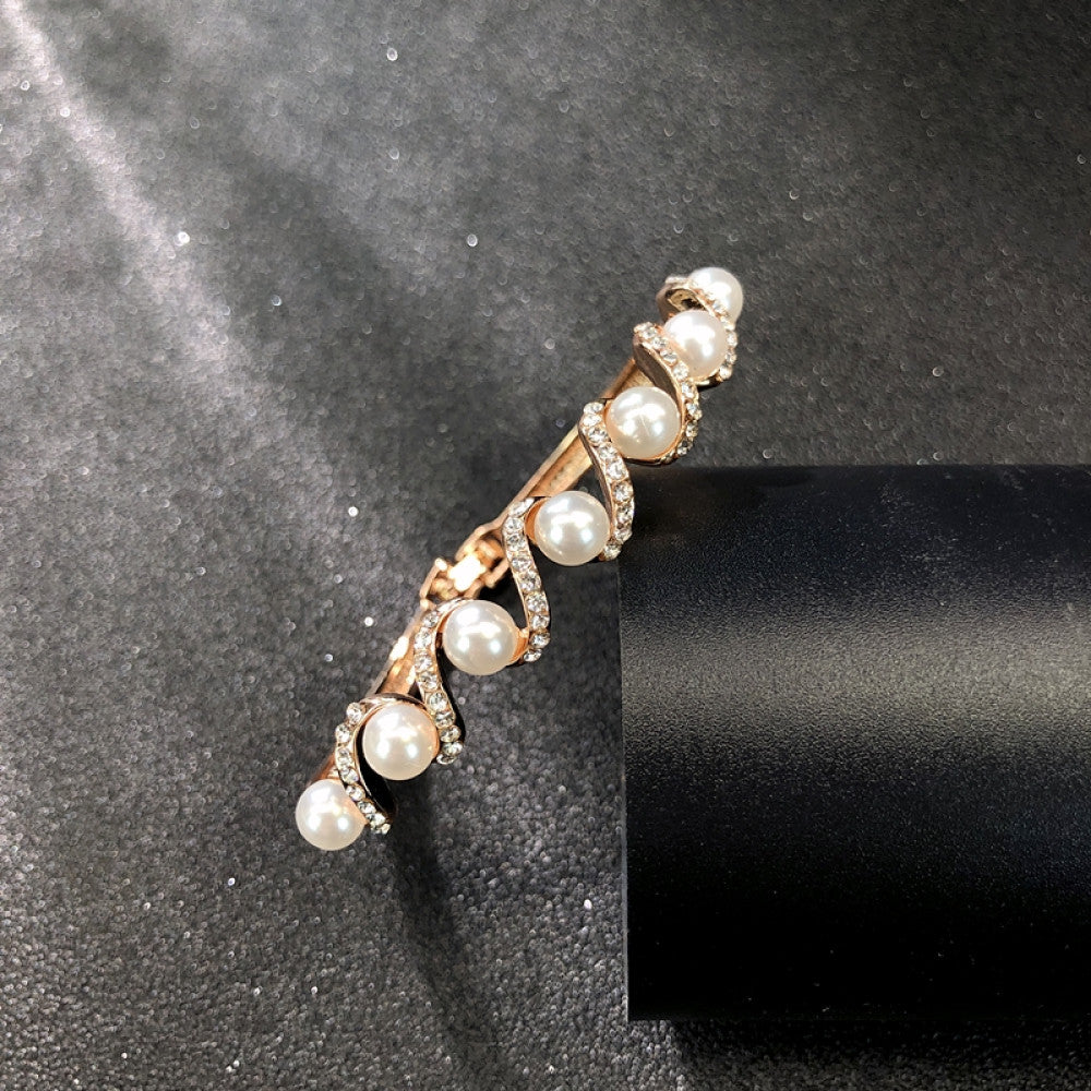 Fashion luxury rose gold bangle with heart-shaped diamond and intricate designs, displayed on black surface, ideal for luxury fashion and special occasion enthusiasts 05