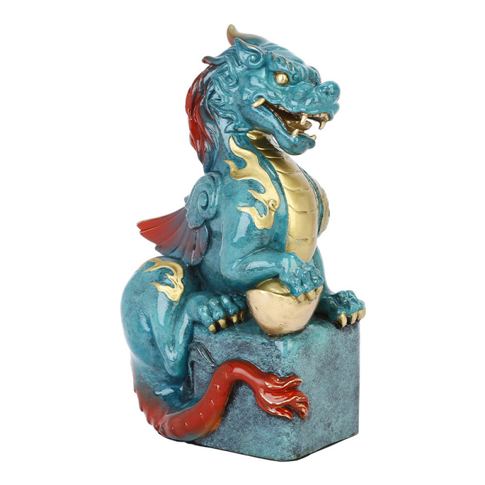 Intricate teal and gold Chinese dragon statue, a symbol of power and good fortune in feng shui, placed on a square base against a warm-toned background 03
