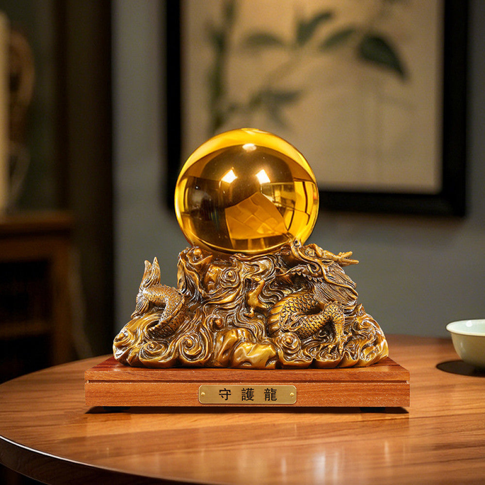 Golden dragon crystal ball statue with intricate carvings, a Feng Shui symbol of good fortune, displayed as elegant home decor on a wooden base against a red background 02