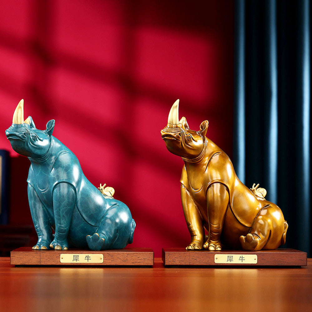 Golden rhino statue with intricate details, a symbol of good luck for home decor, set against a red background 01