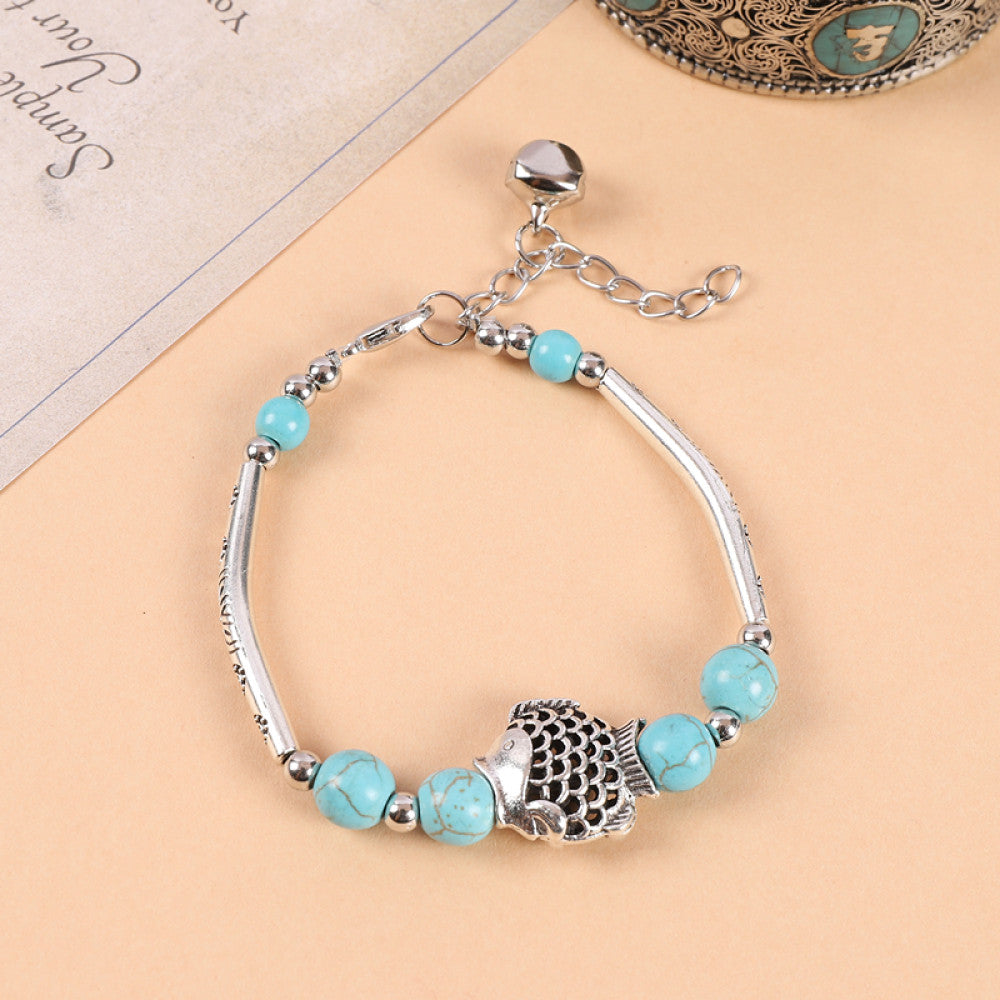 Densely packed turquoise beads, lush and vibrant appearance.