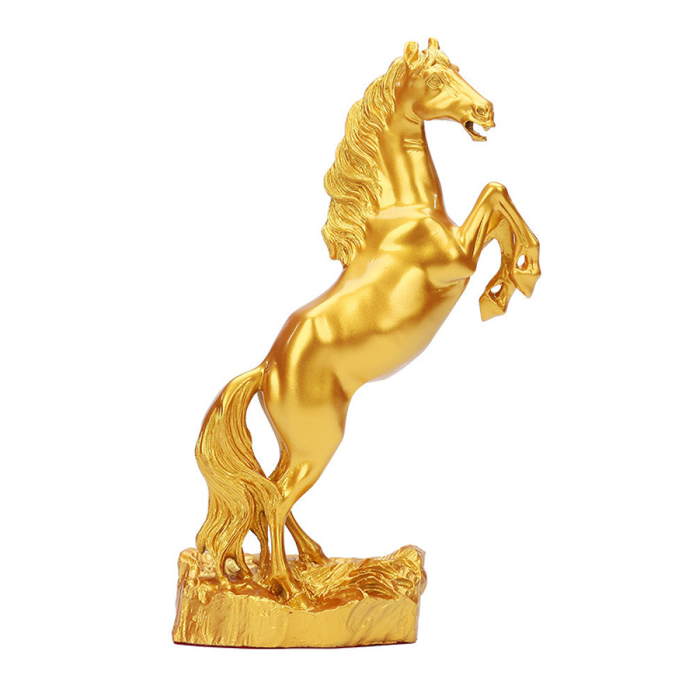 Golden rearing horse statue with a polished finish, a Feng Shui symbol of good fortune and strength, displayed as elegant home decor against a red background 02