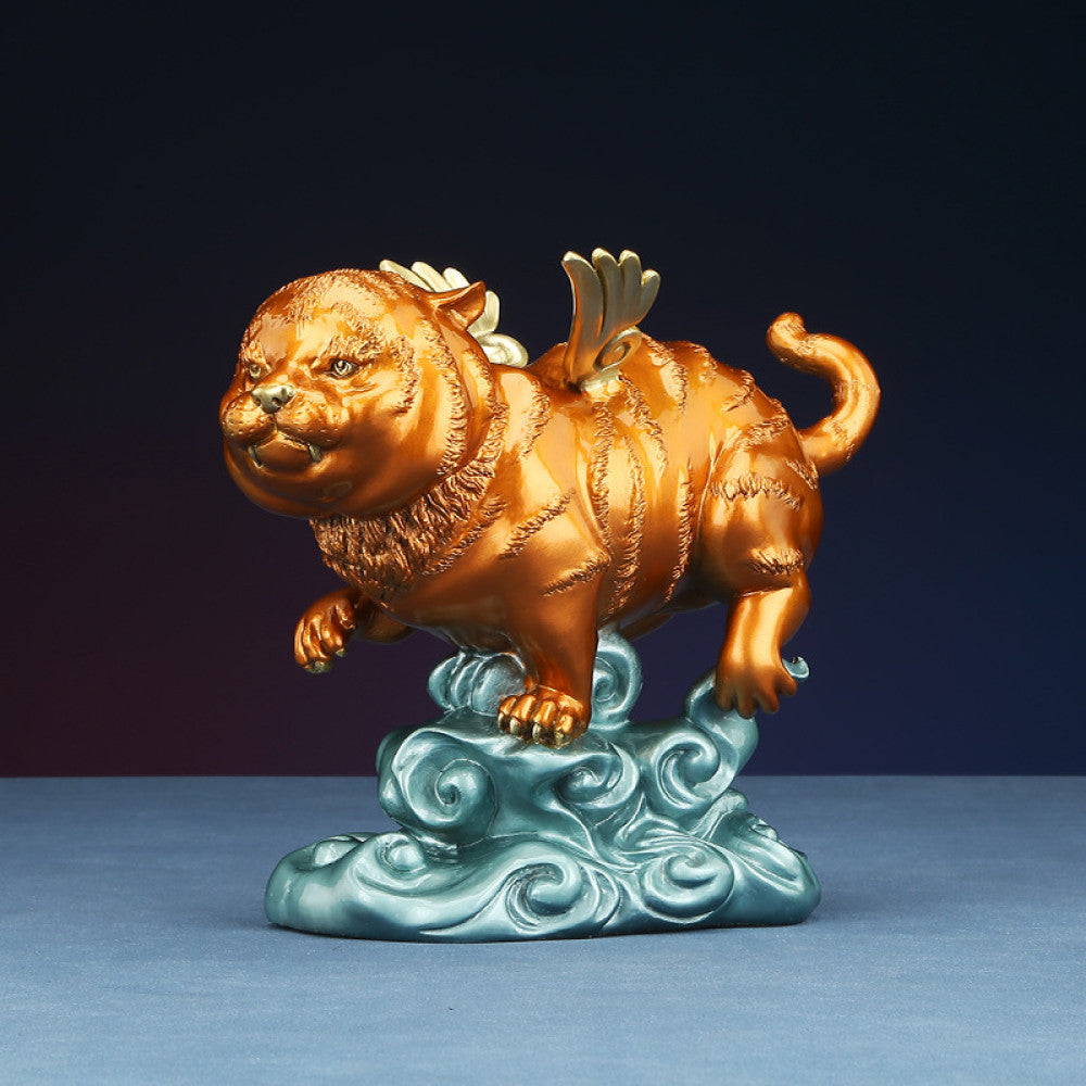 Golden winged tiger statue with blue cloud base, a Feng Shui symbol of strength and good fortune, displayed as elegant home decor against a dark background 01