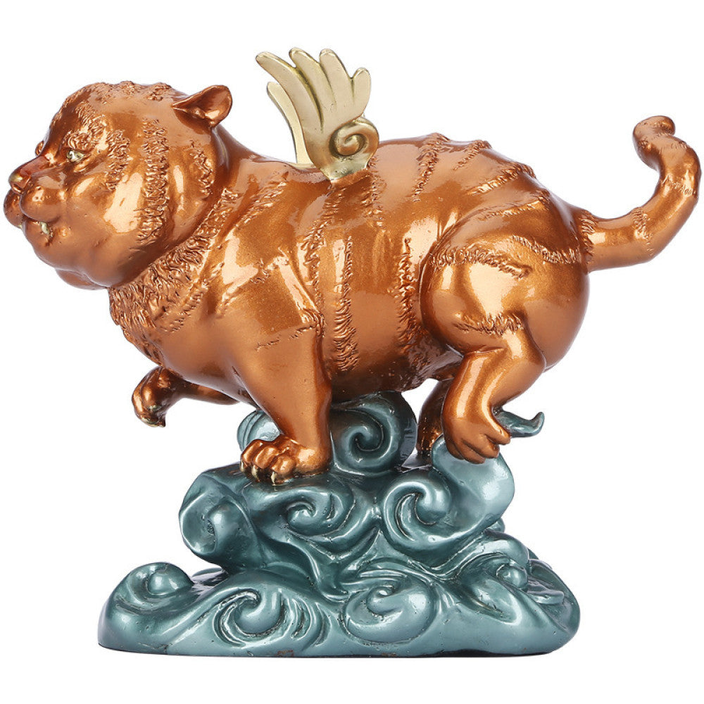 Golden winged tiger statue with blue cloud base, a Feng Shui symbol of strength and good fortune, displayed as elegant home decor against a dark background 04
