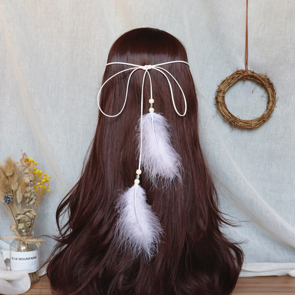 hair band featuring abundant white feather tassels, wooden bead accents, displayed with dried flower vase woven wreath decor 01