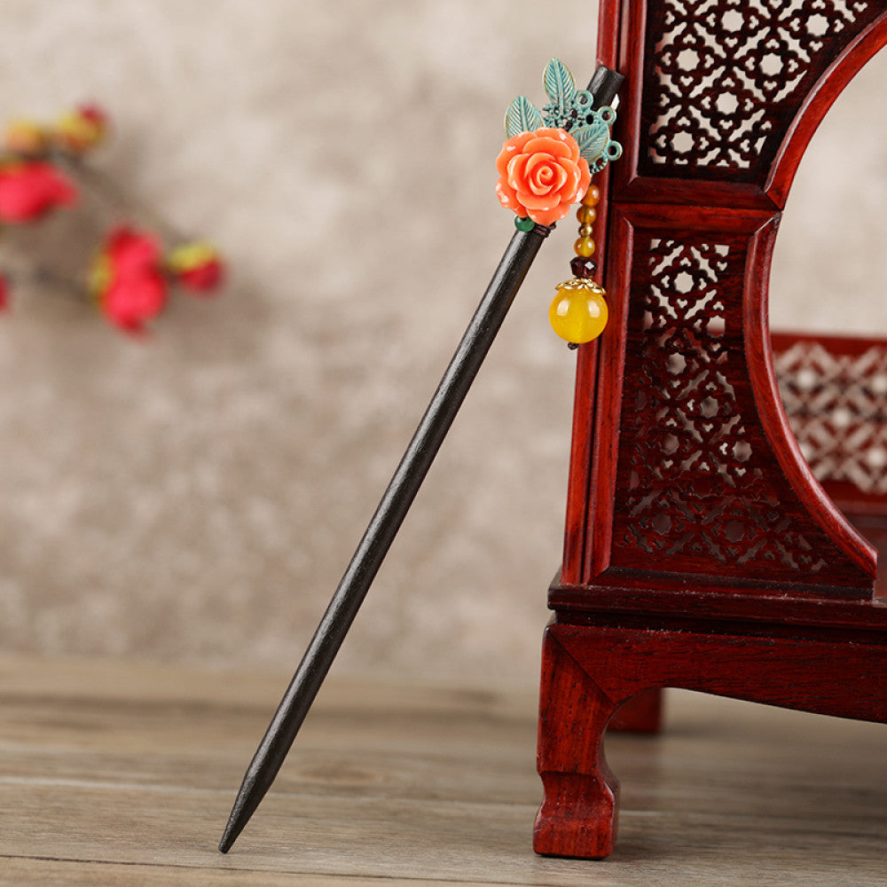 Boho vintage ethnic hair stick featuring a dark wooden-look handle, topped with light green flower, red bead 03