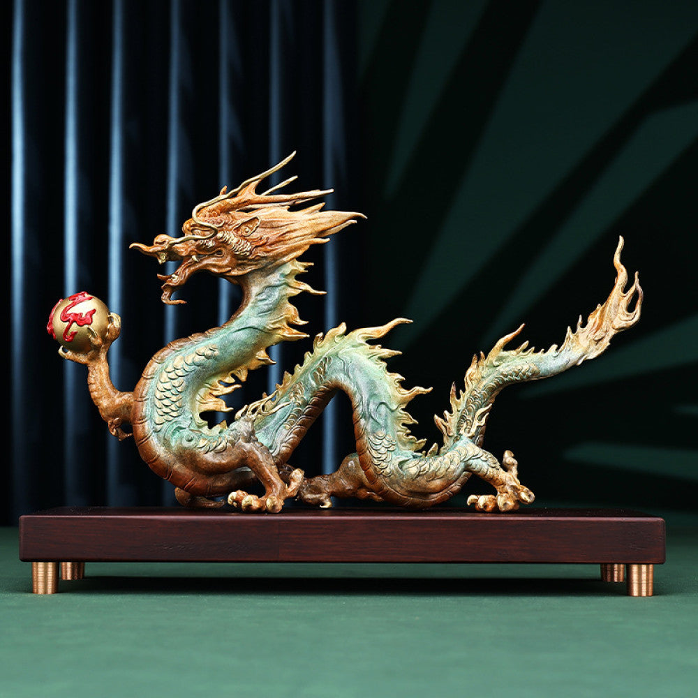 Colorful Chinese dragon statue with a red pearl, a Feng Shui symbol of good fortune and strength, displayed on a wooden base as elegant home decor against a dark background 02