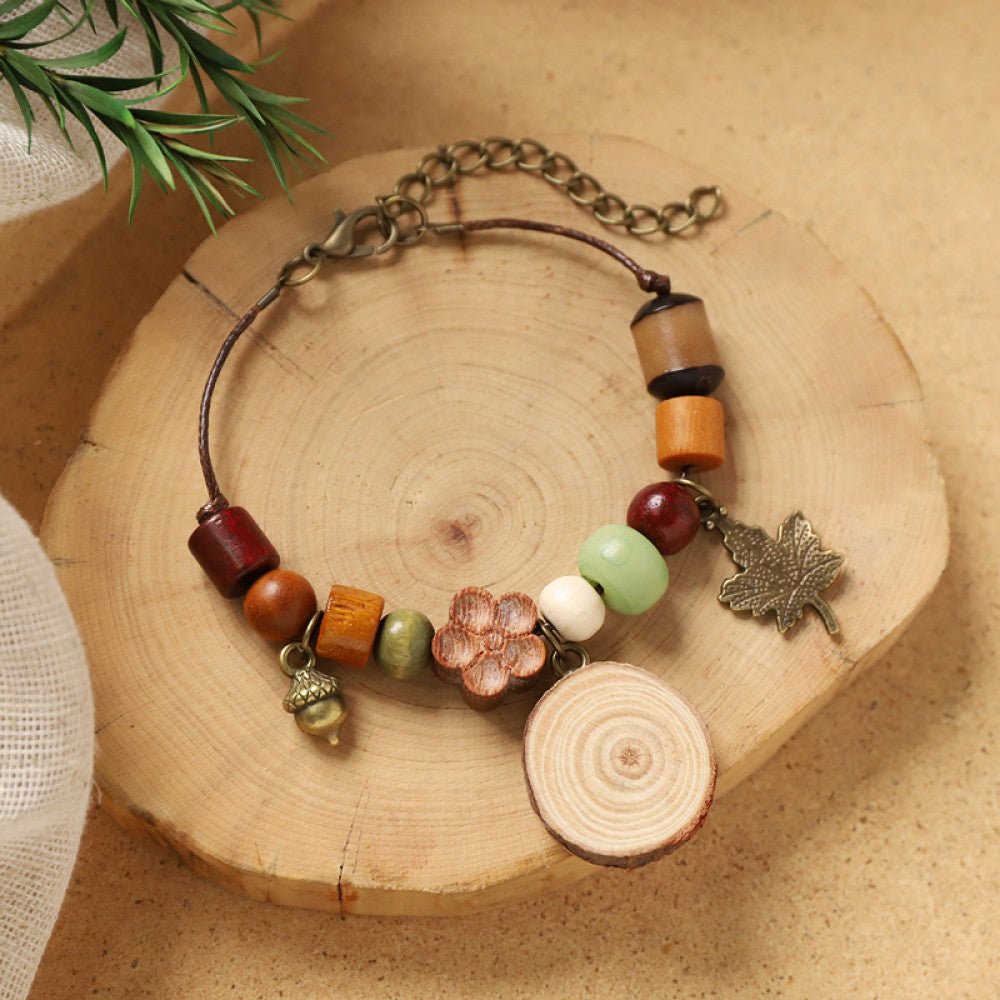 Colorful beads with a mushroom pendant, playful and cute.