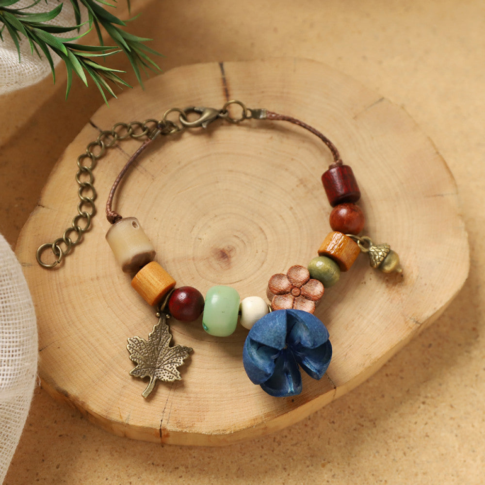 Orange fruit charm, bright and sunny.