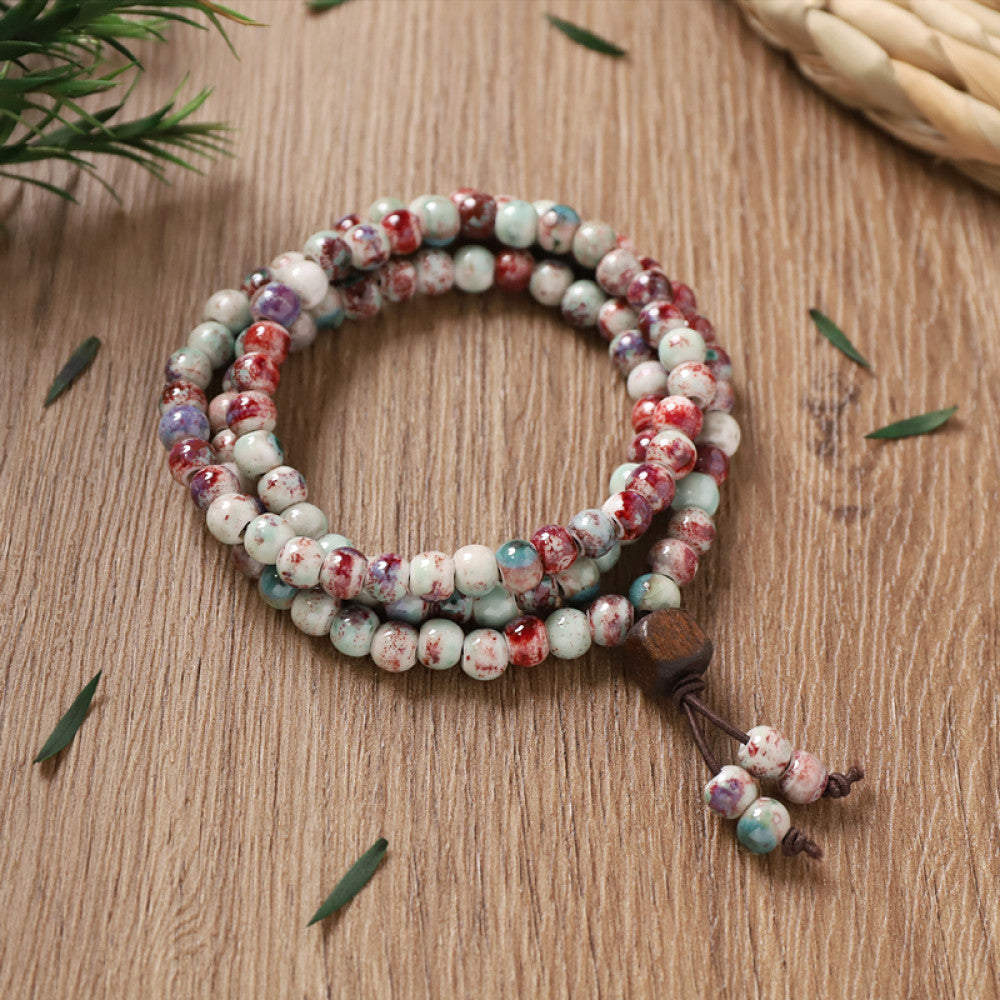 Pink and white marbled beads, gentle and delicate, light tassel detail.
