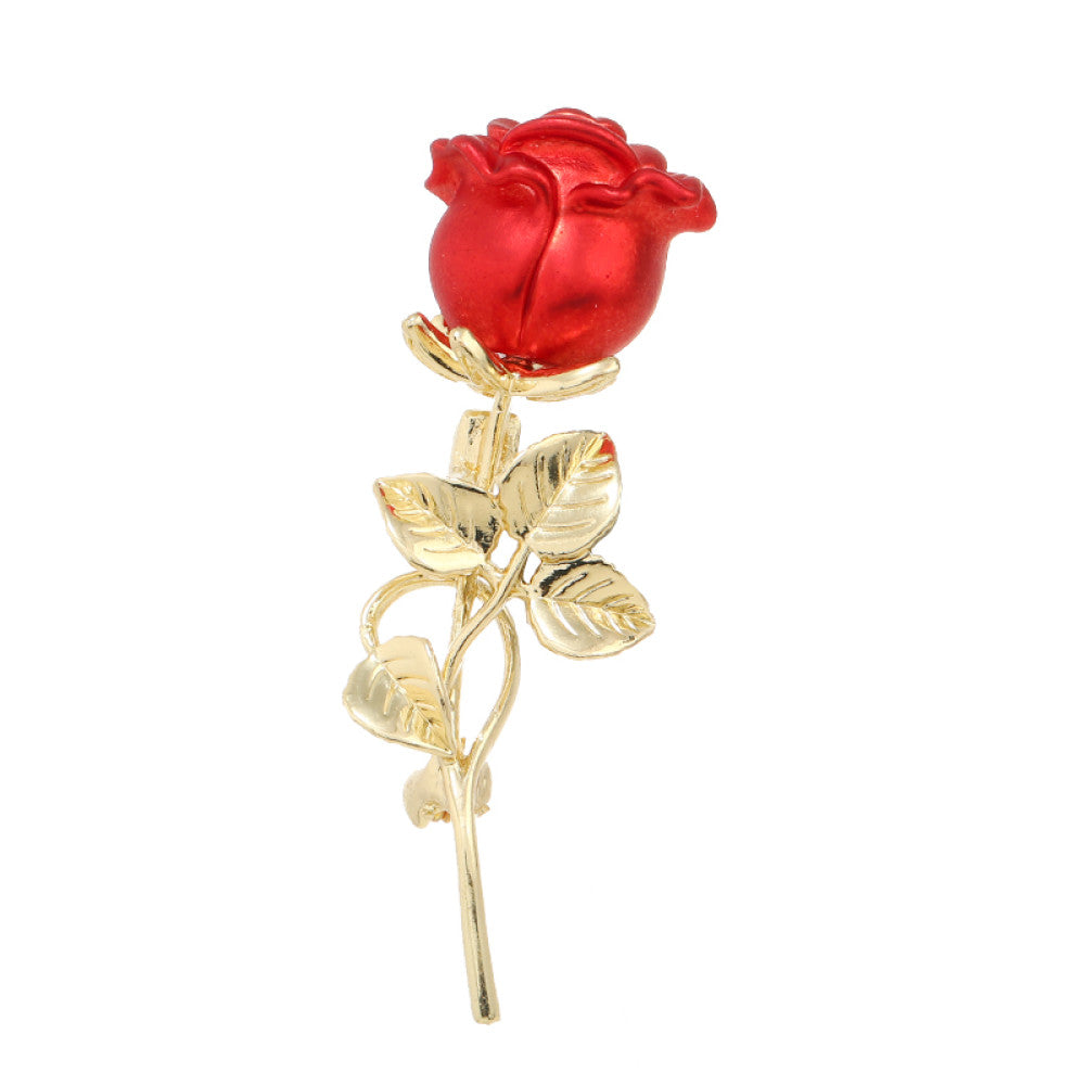 This elegant brooch features vibrant red petals with a lustrous pearl center, set on a gold stem with sparkling crystal accents. A romantic, eye-catching accessory 06