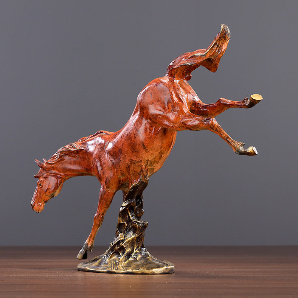 Red galloping horse statue with intricate details, a Feng Shui symbol of success and strength, displayed as elegant home decor on a wooden table against a gray background 01