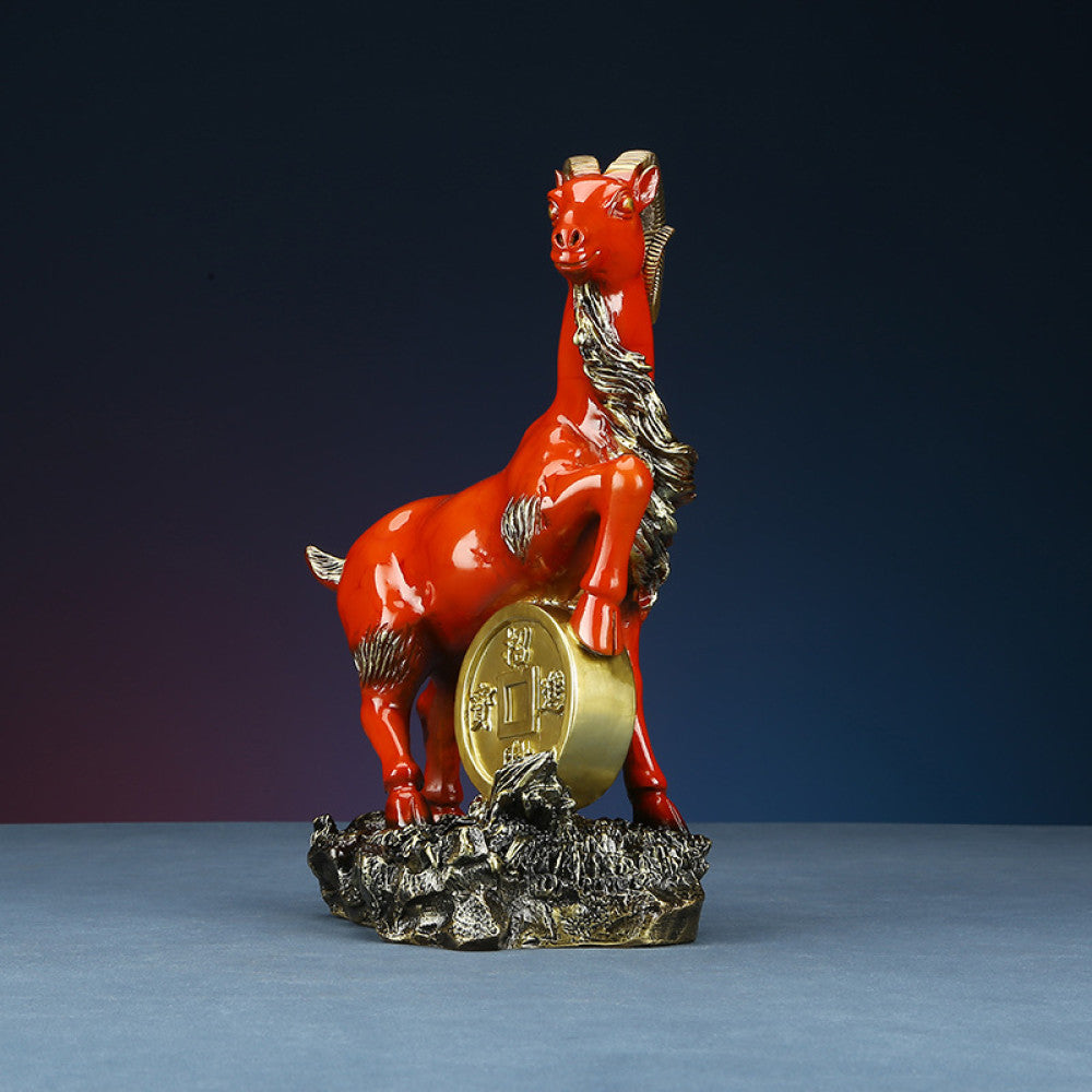 Red goat statue with golden coin detail, a Feng Shui symbol of wealth and good fortune, displayed as elegant home decor against a dark background 02