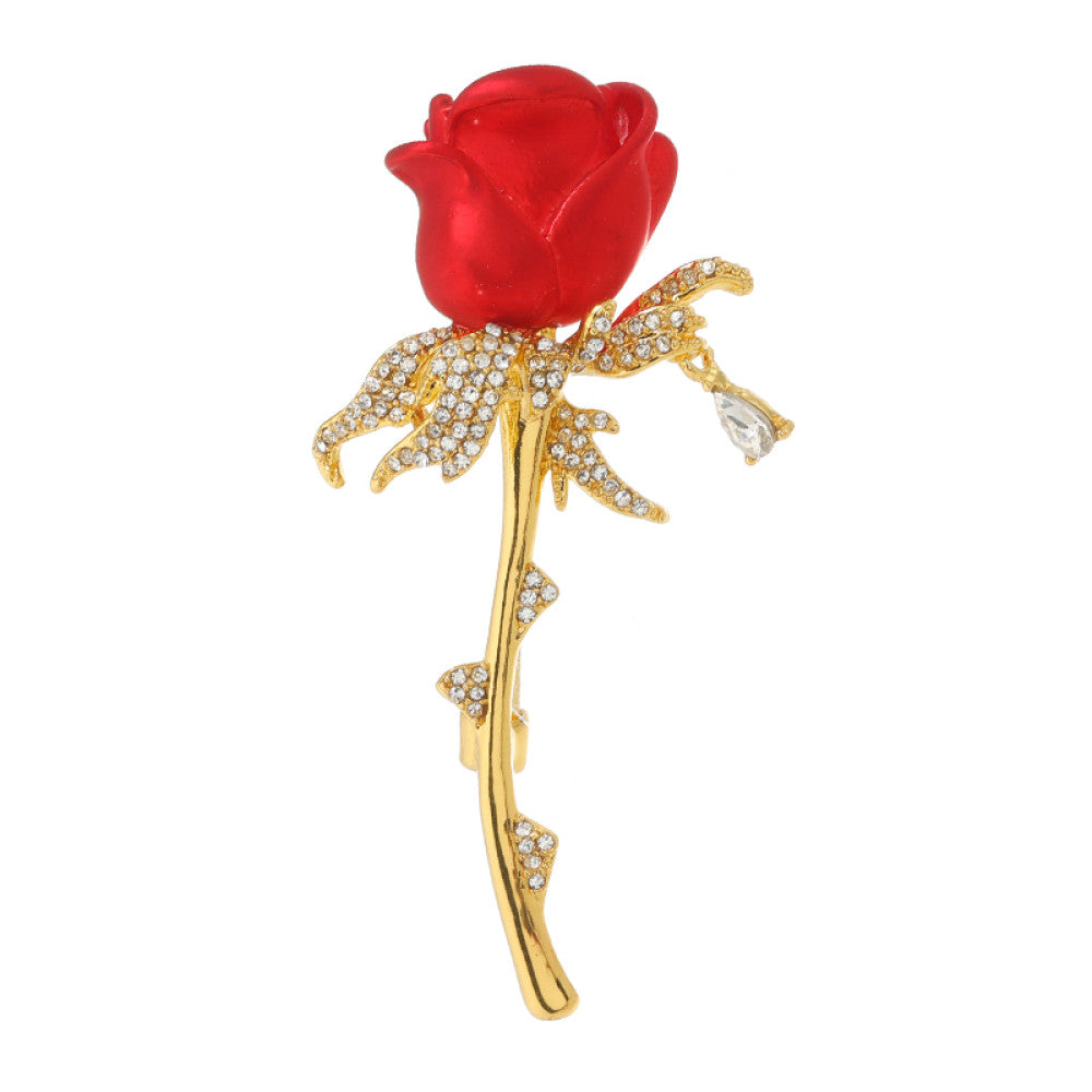 This elegant brooch features a vivid red rose with a gold crystal-encrusted stem, accented by a delicate teardrop detail. A romantic accessory to elevate any outfit 03