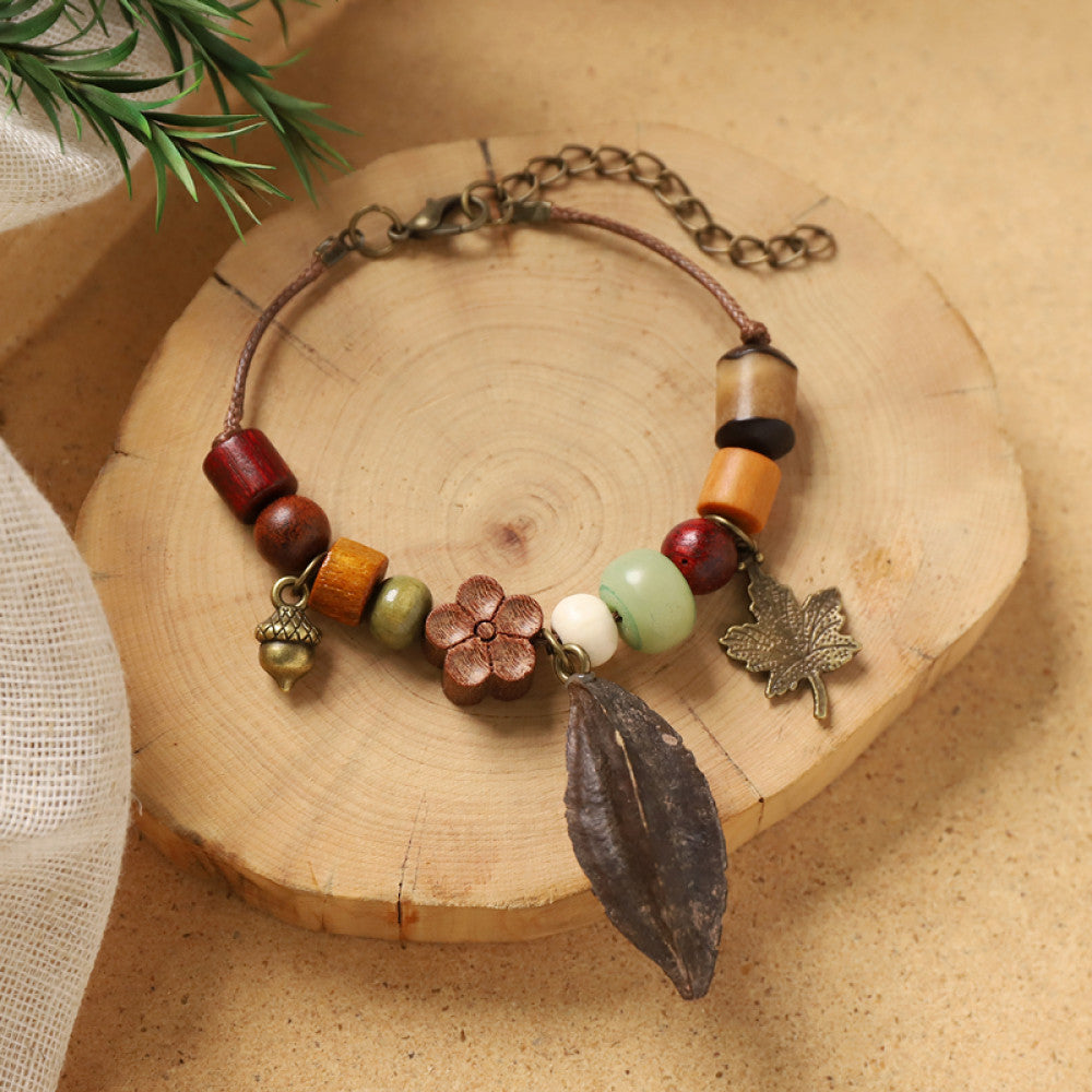 Smooth round wood charm, gentle and warm.