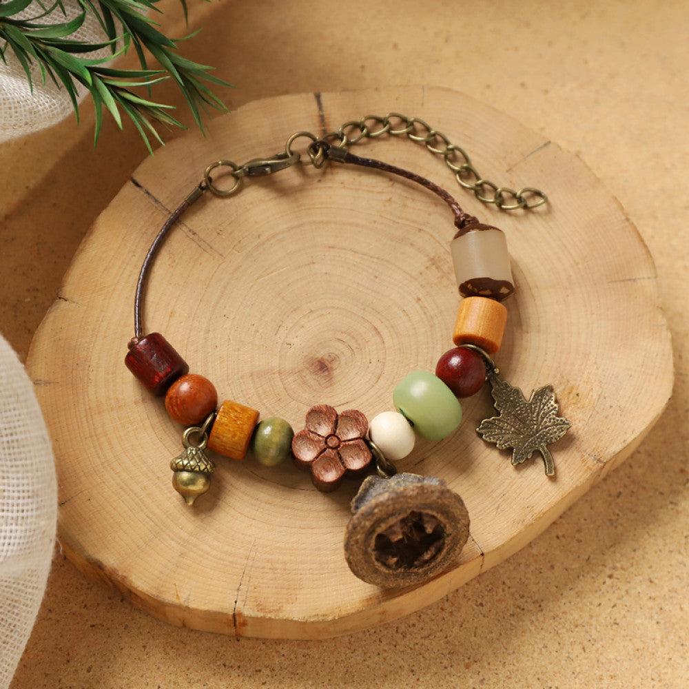 Wood beads with silver details, bohemian and elegant.
