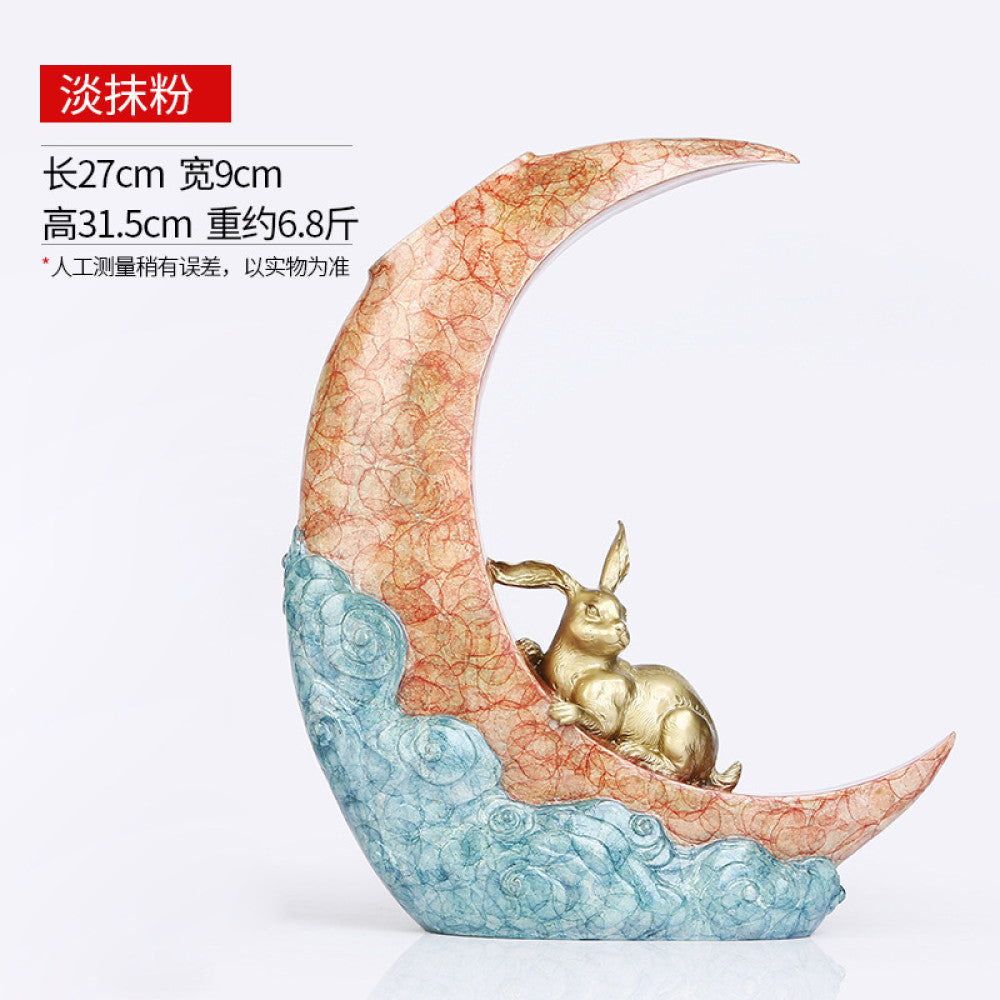Traditional Chinese bronze sculpture of a crescent moon with a rabbit and cloud patterns, placed against a dark gradient background 01