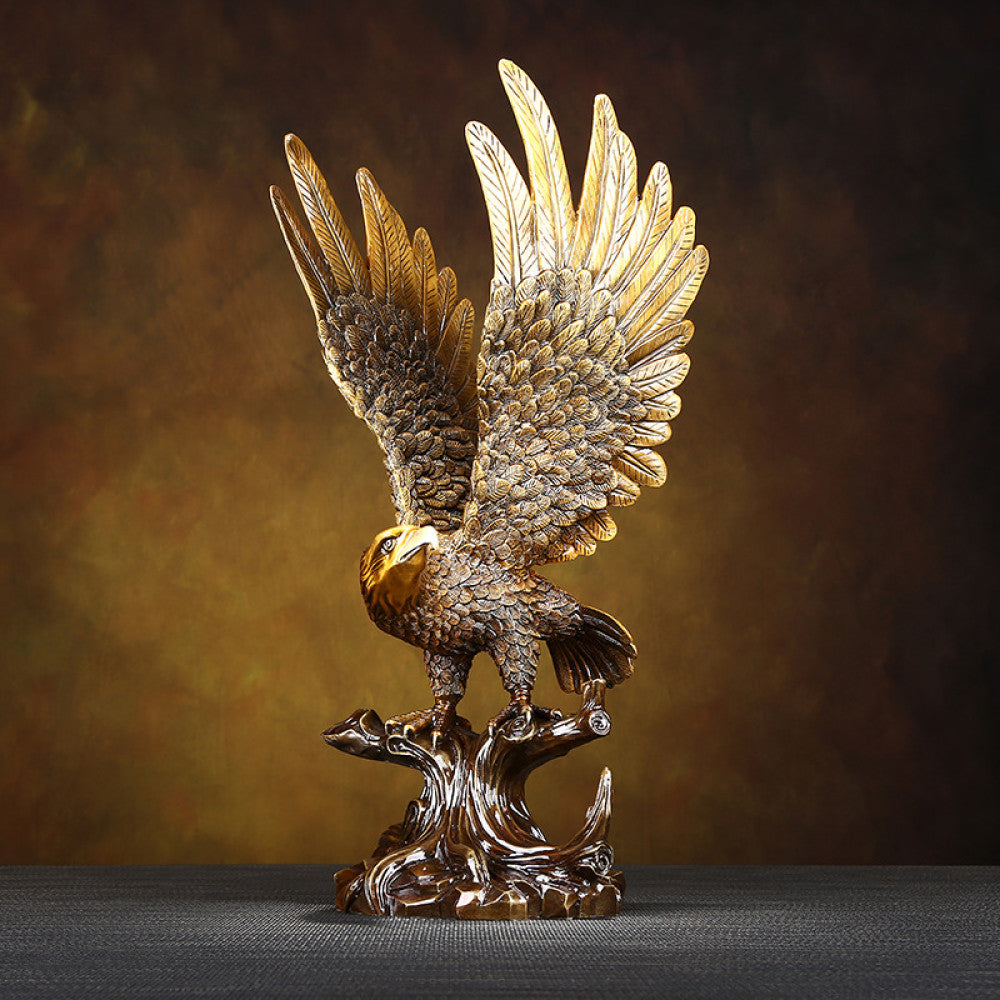 Traditional Chinese bronze eagle statue with spreading wings, perched on a branch - shaped base with a wooden platform, set against a warm brown background 01