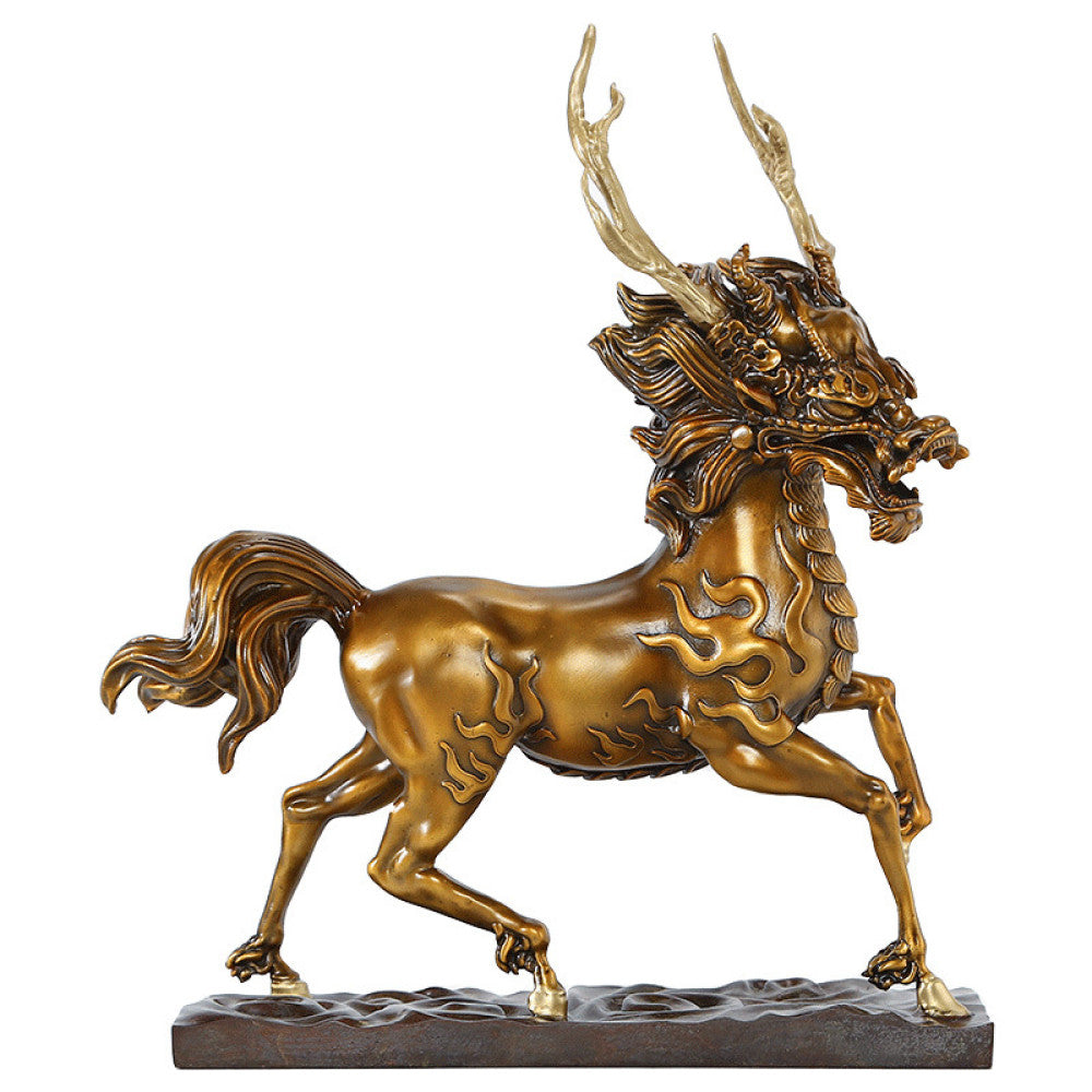 Golden traditional Chinese bronze Qilin sculpture with deer antlers and horse-like form, displayed on a dark base against a white background