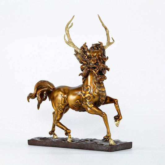 Golden traditional Chinese bronze Qilin sculpture with deer antlers and horse-like form, displayed on a dark base against a white background 01