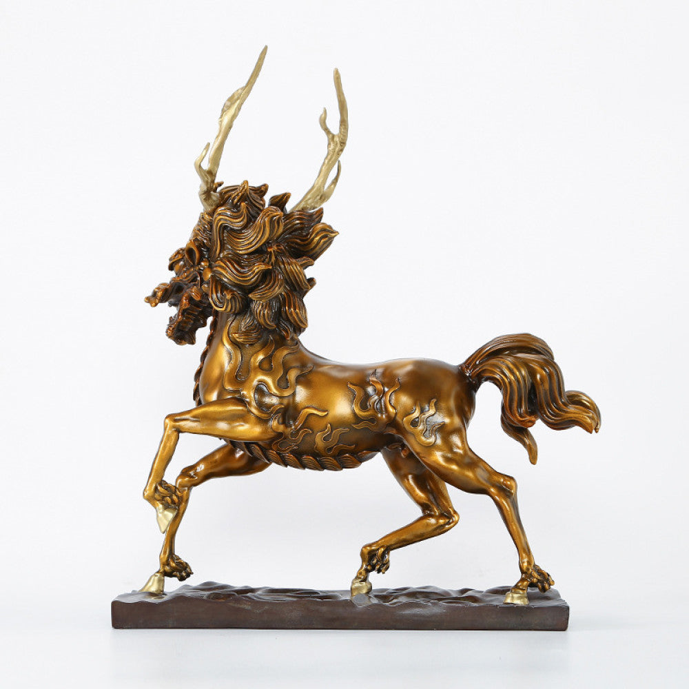 Golden traditional Chinese bronze Qilin sculpture with deer antlers and horse-like form, displayed on a dark base against a white background 02