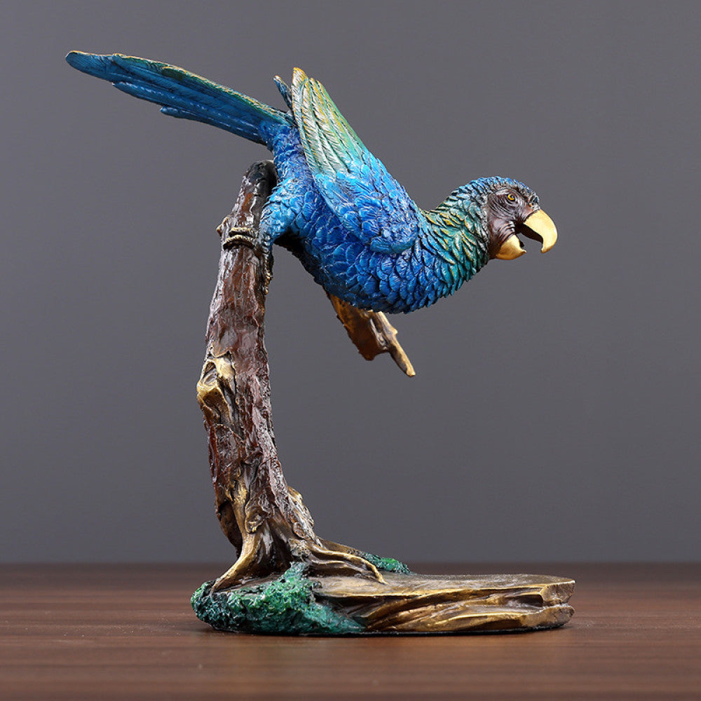 Colorful traditional Chinese parrot statue with blue and green hues, perched on a branch - shaped base, set against a gray background 02