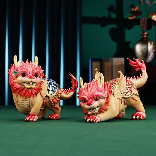 Pair of colorful traditional Chinese Qilin statues with red and blue - golden details, placed against a red background with Chinese fan decoration 01
