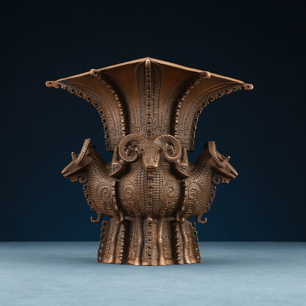 Traditional Chinese four - sheep bronze zun vessel with intricate carvings, isolated on white background 03