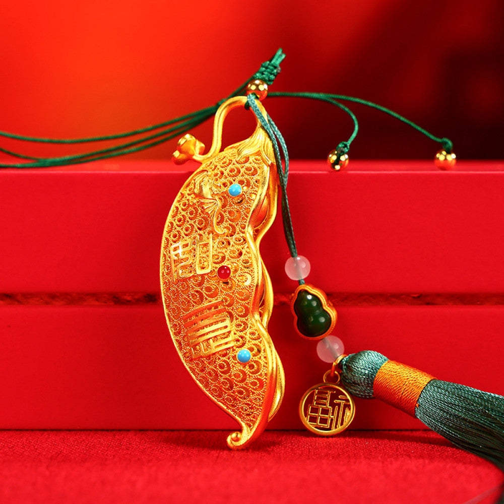 Traditional Chinese gold - plated bean pod pendant with lucky characters, gem inlays, and tassel (featuring "Fu" symbol), isolated on white background 01