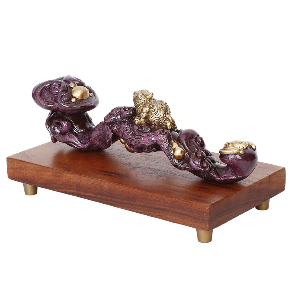 Traditional Chinese ruyi sculpture with golden pixiu and pearl details, placed on wooden base against dark blue curtain and traditional lattice background 03