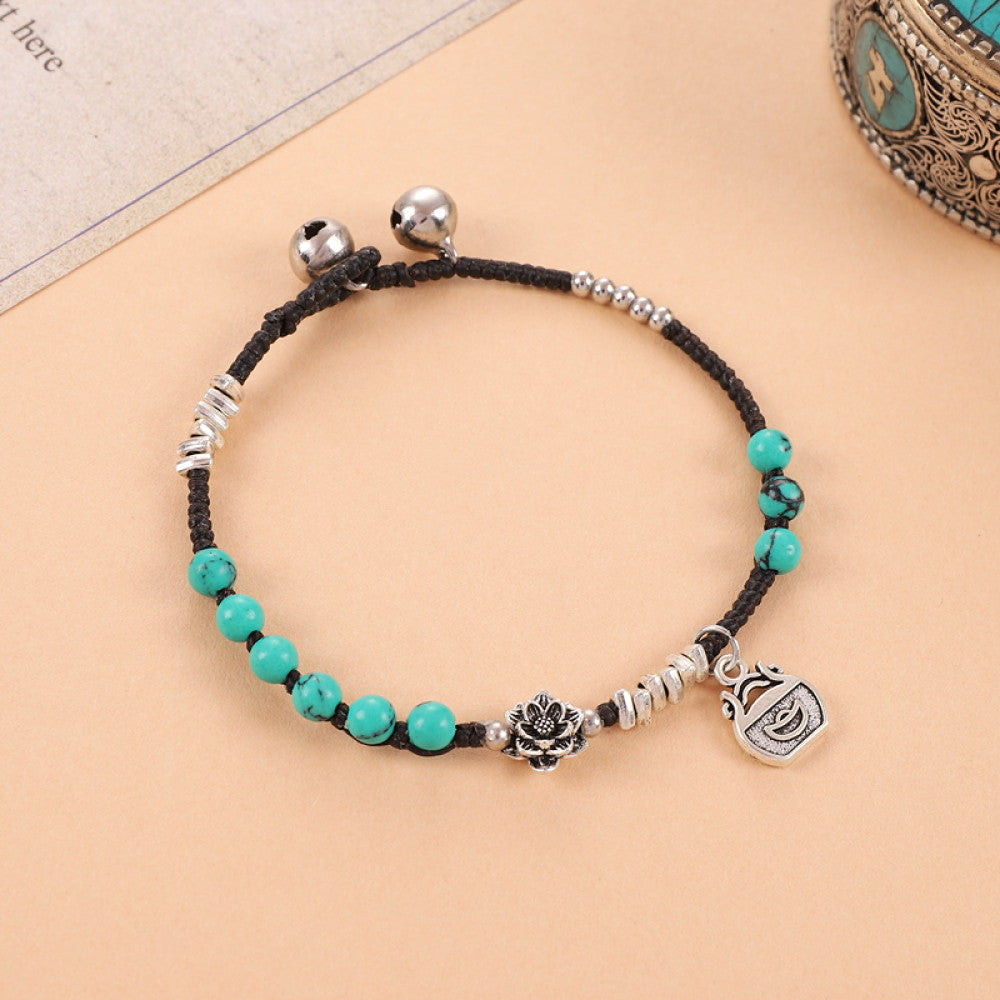 Clustered turquoise beads with silver accents, light and natural.