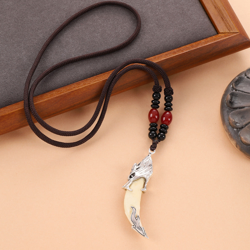 Vintage wolf tooth pendant necklace for men with tribal style metal wolf design and beaded cord 03