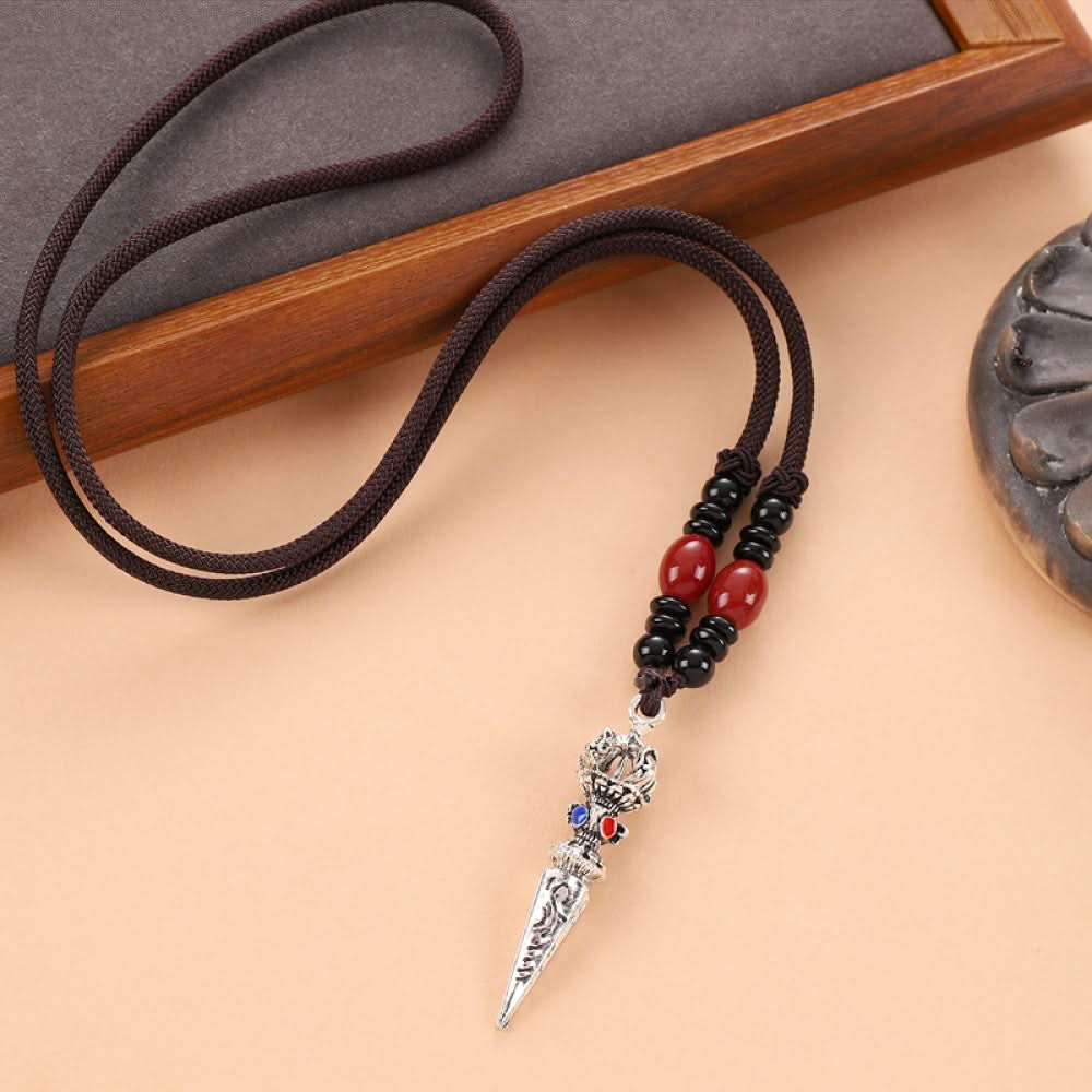 Vintage wolf tooth pendant necklace for men with tribal style metal wolf design and beaded cord 15