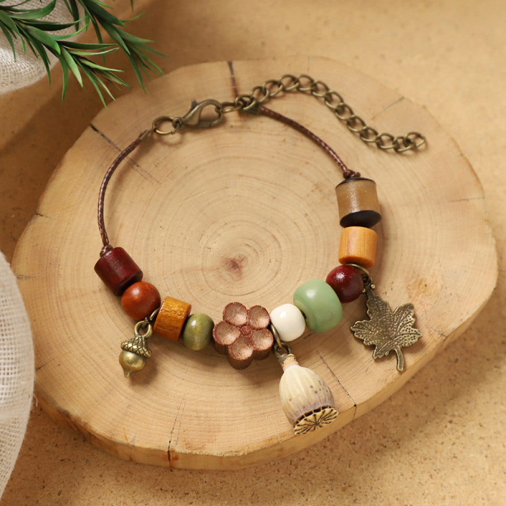 Thin wood slice pendant, lightweight and delicate.