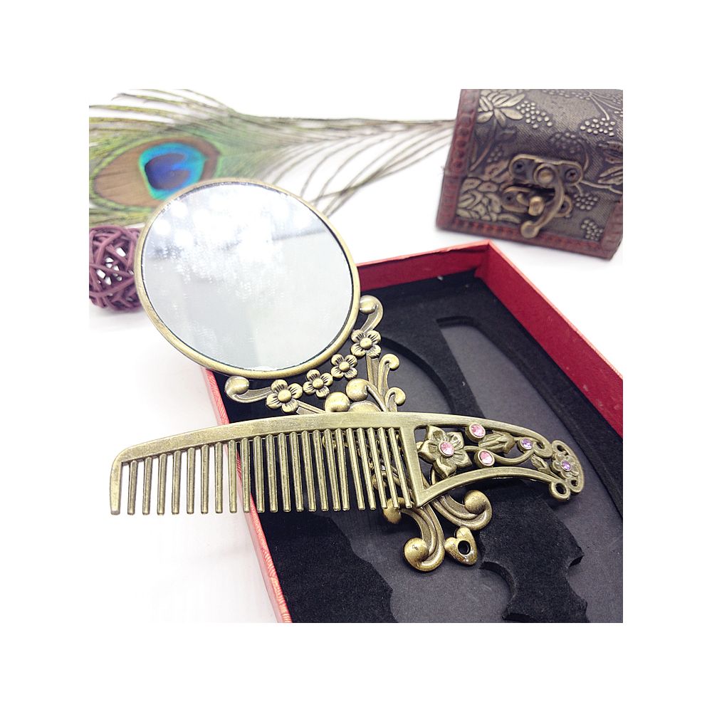 A wooden comb paired with gemstone accessories and decorative items displayed as a gift set.