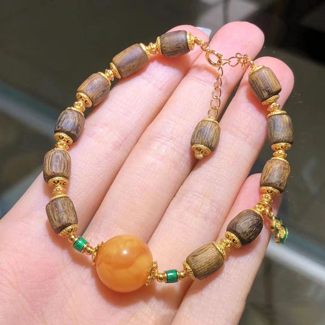Adjustable barrel wood bead bracelet with amber and green accents | DIY Jade