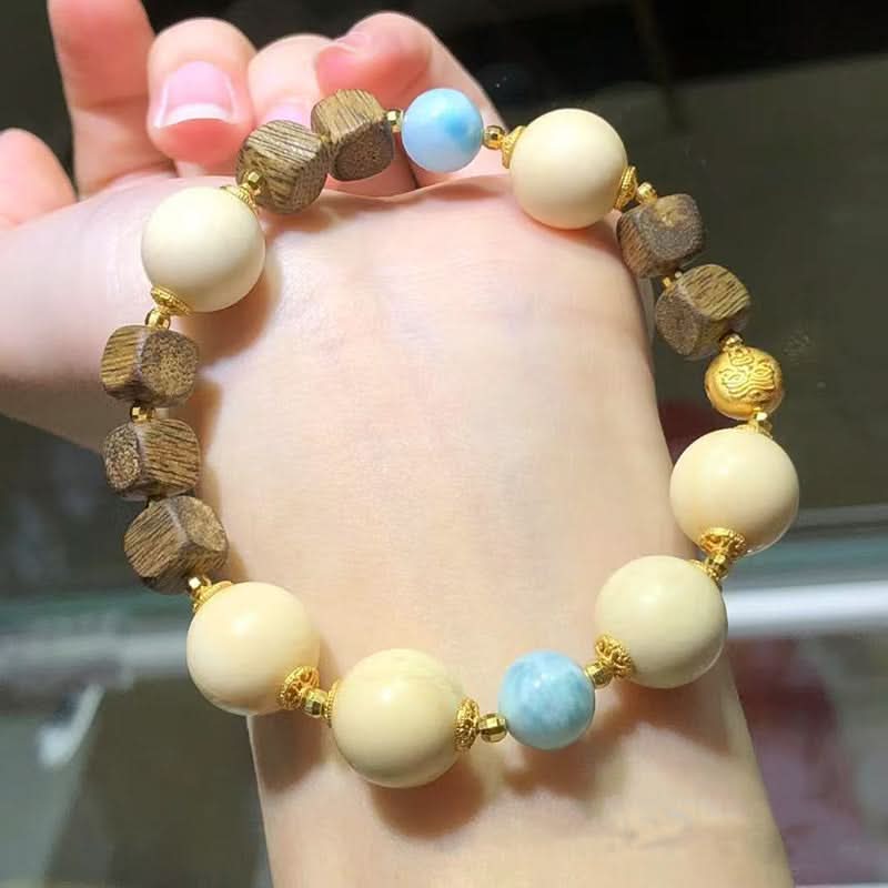Cream bead and wood bracelet with blue stone accents | DIY Jade