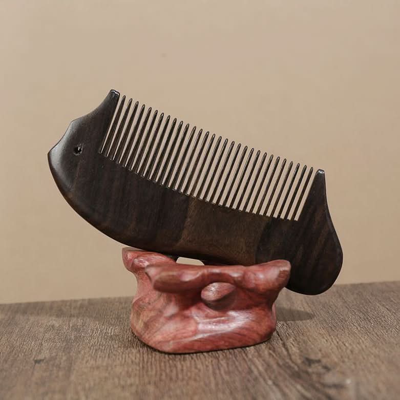 Back detail of ebony wooden hair comb