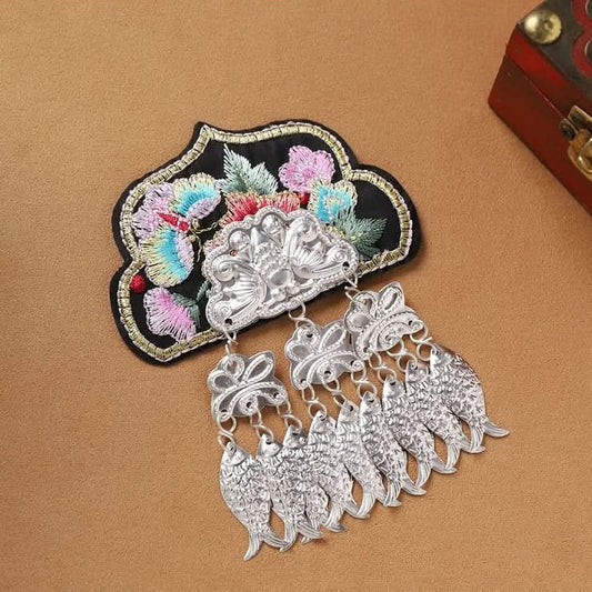 Large ethnic embroidered silver tassel brooch