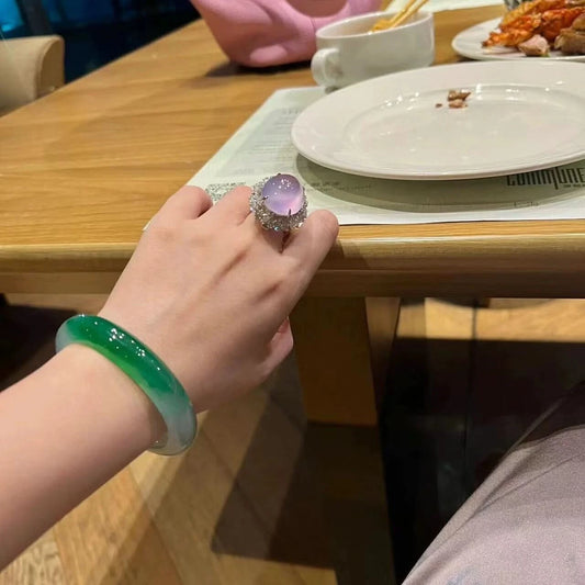 Green-white jadeite bangle paired with purple ring, elegant dining lifestyle shot | DIY Jade
