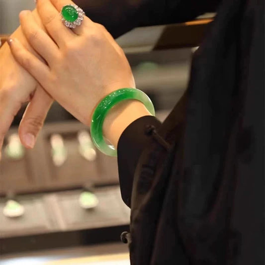 Half green half white gradient jade bangle worn with matching jade ring, luxury jewelry styling | DIY Jade