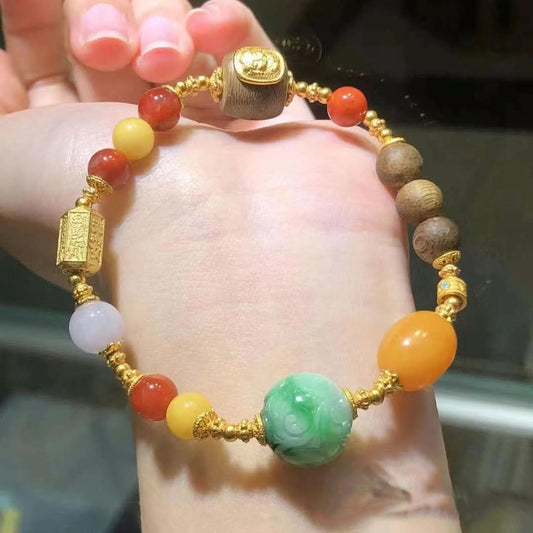 Worn view of multi-gemstone bracelet with jade, amber and wood | DIY Jade