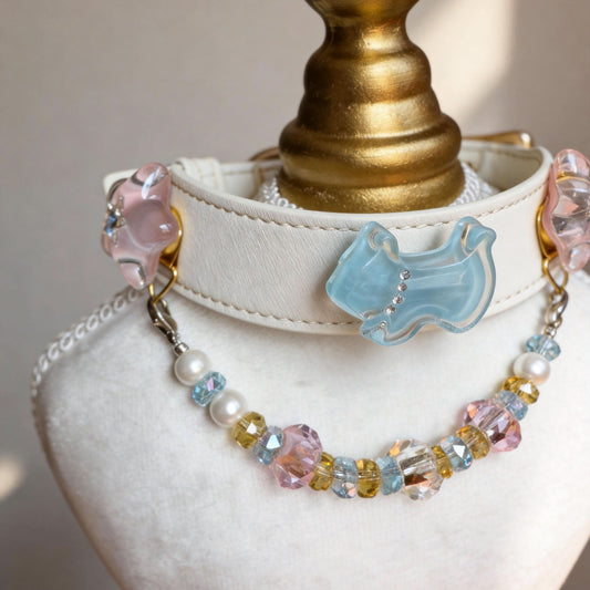 Mannequin bust displaying white pet collar decorated with colorful jade beads | DIY Jade