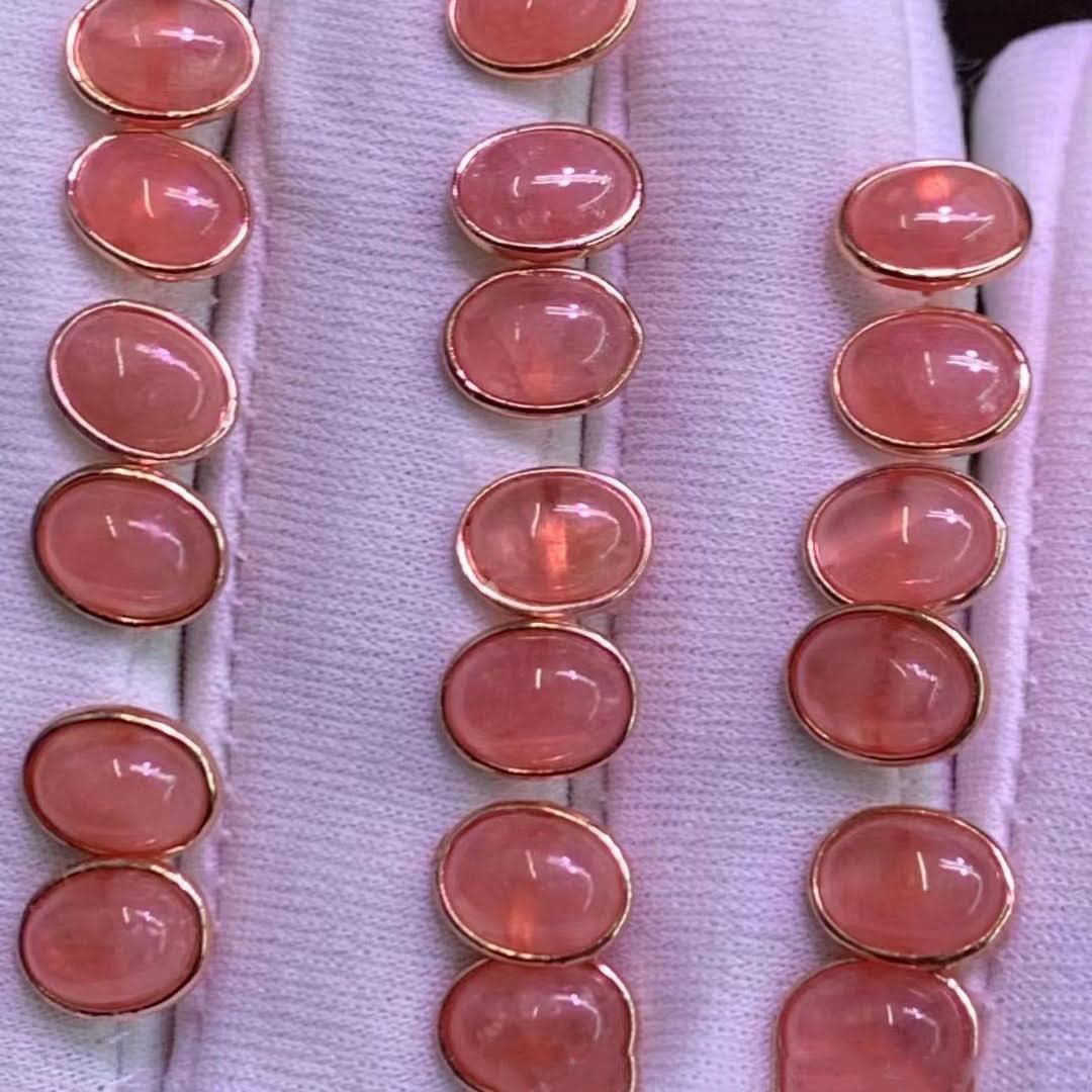 Rose gold stud earrings with pink chalcedony oval cabochons, bulk display in jewelry box | DIY Jade
