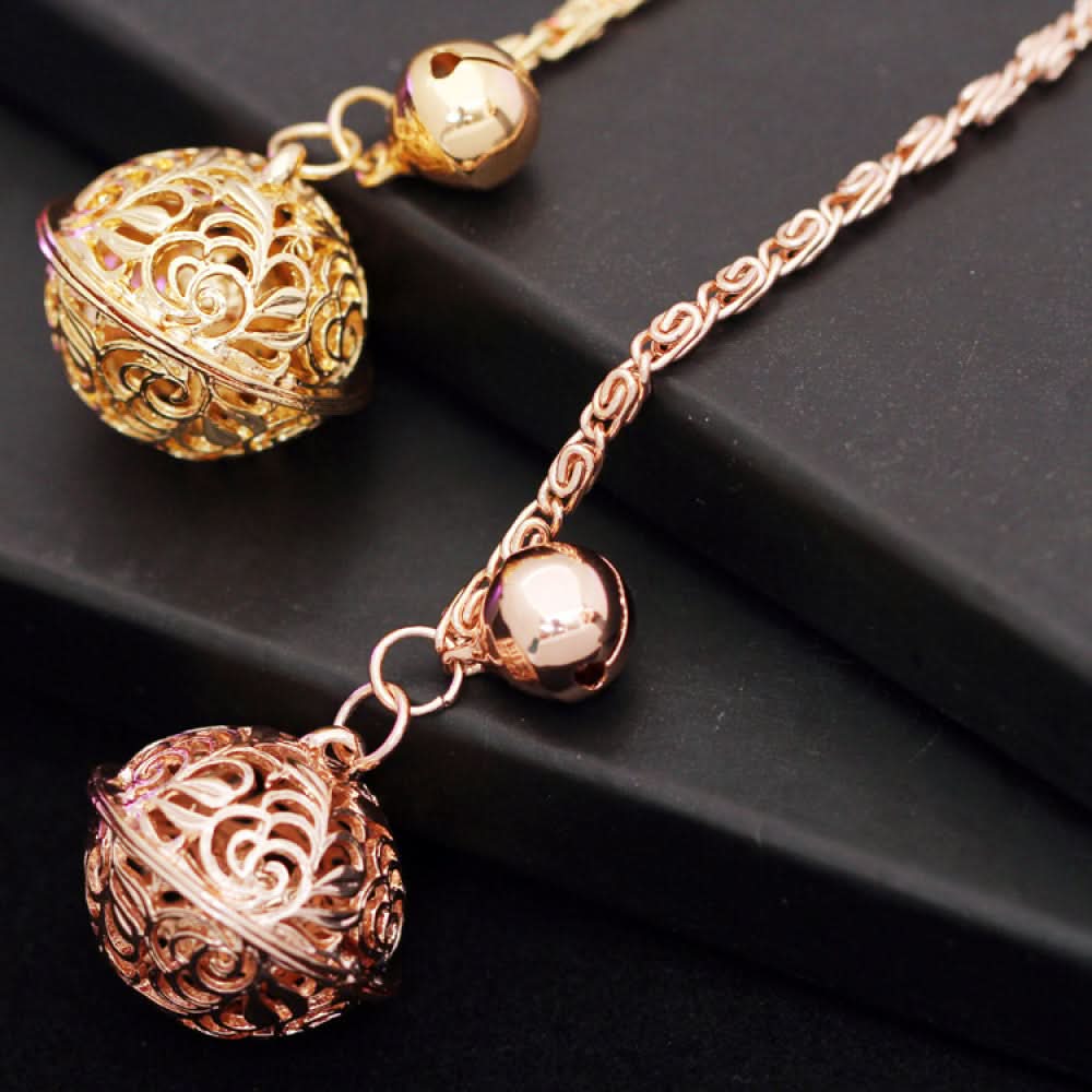 Rose gold two-tone openwork palace bell charm bracelet with multiple charms | DIY Jade