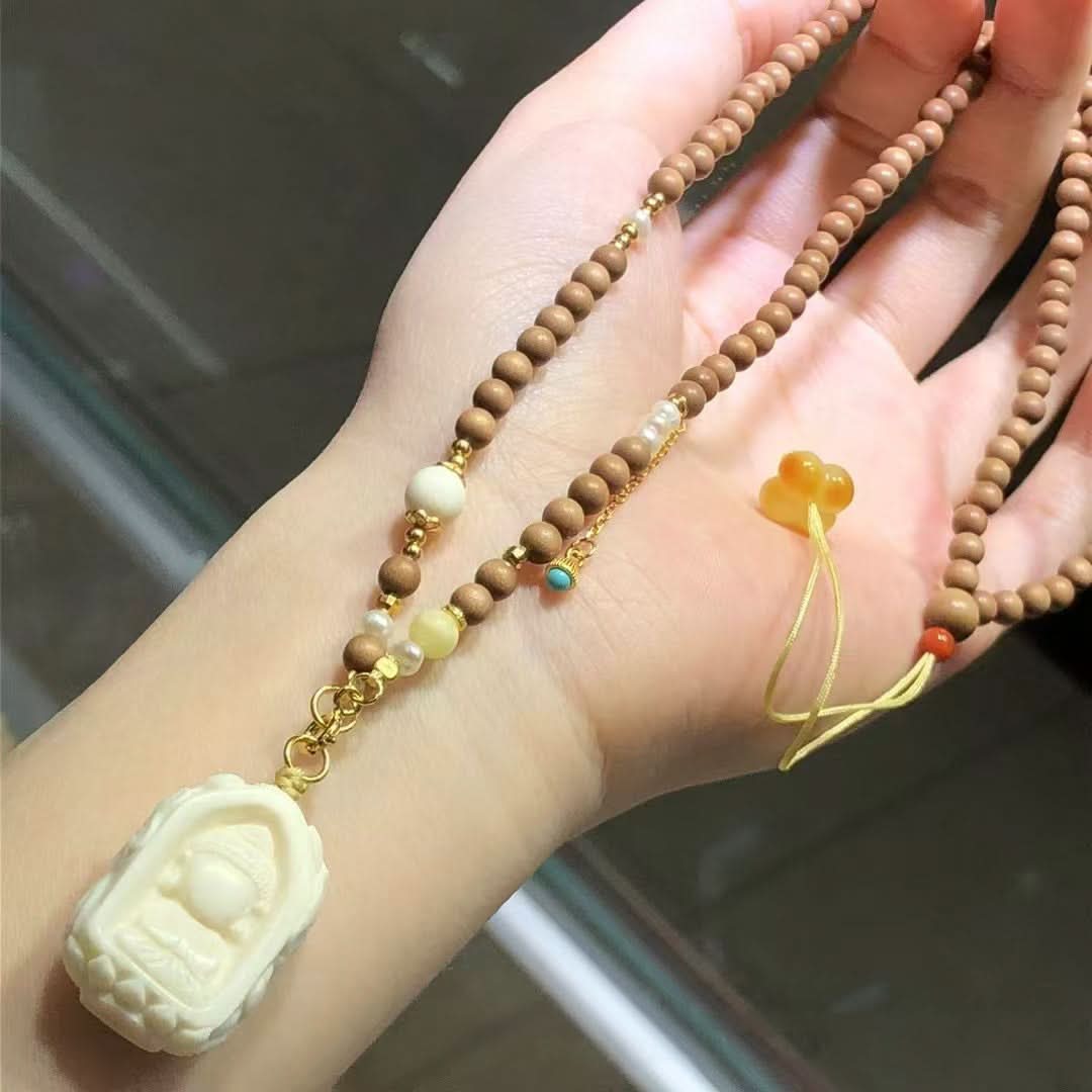 Sandalwood bead mala necklace with carved white buddha charm | DIY Jade