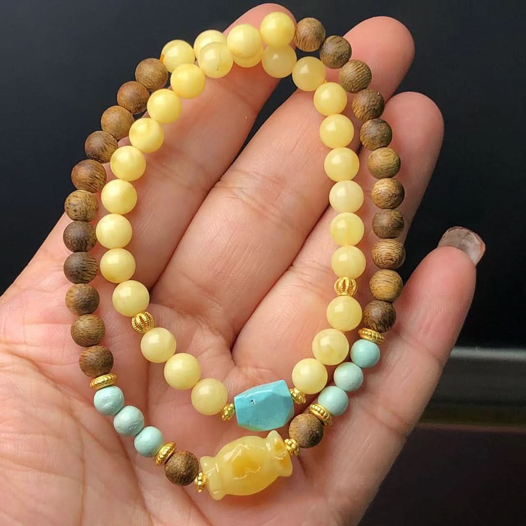 Yellow amber and wood double strand bracelet with turquoise and fish charm | DIY Jade