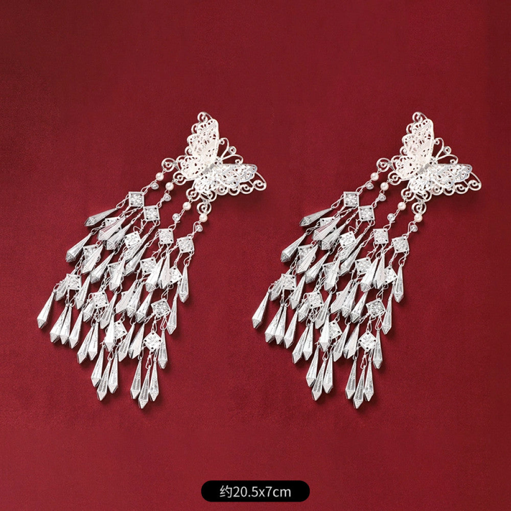 ethnic 2-piece silver-tone decorative ornament set featuring butterfly, lotus details, plus fish-shaped and pearl tassel pendants