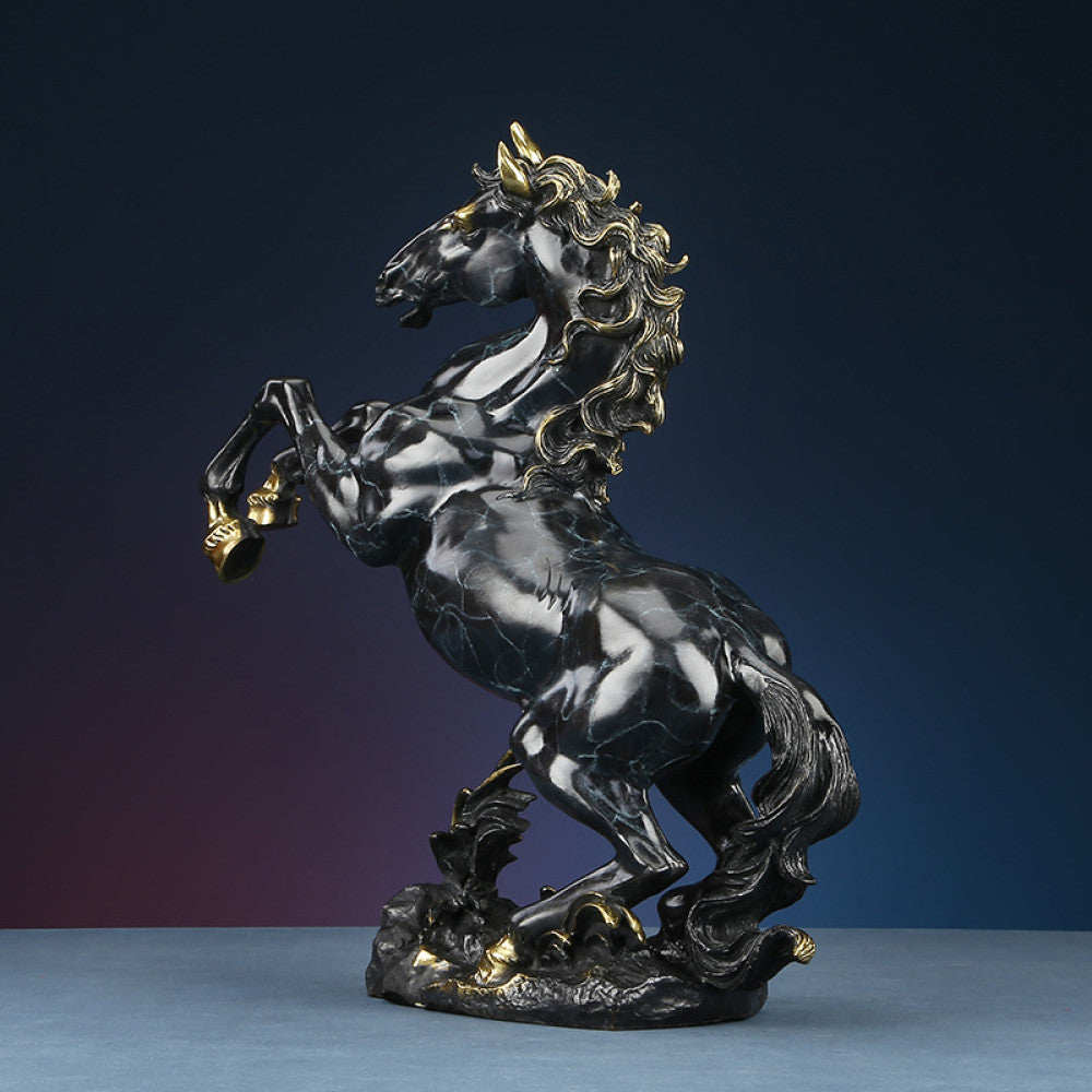 Black and gold rearing horse statue with intricate golden details, a Feng Shui symbol of success and strength, displayed as stylish home decor against a dark blue gradient background